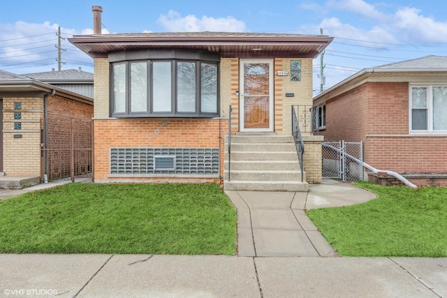 view of front of home with a front lawn