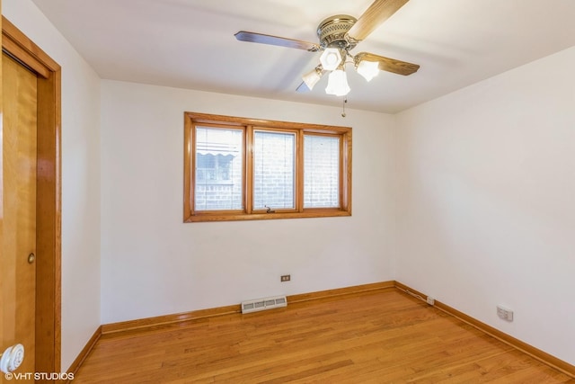 unfurnished room with ceiling fan and light hardwood / wood-style flooring