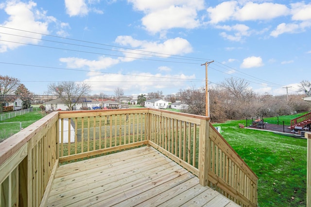 wooden terrace with a yard