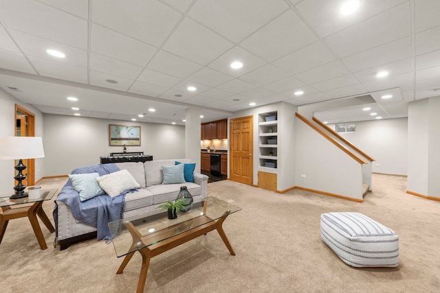 living area with recessed lighting, baseboards, and light colored carpet