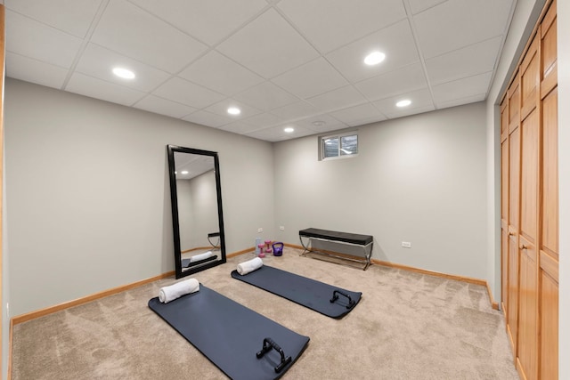 workout area with recessed lighting, baseboards, a drop ceiling, and light colored carpet