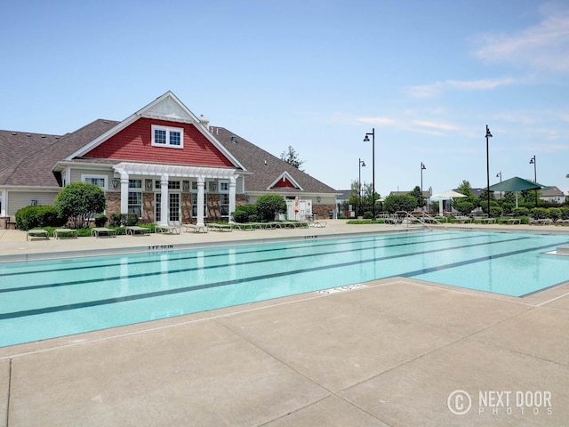 view of pool with a patio area