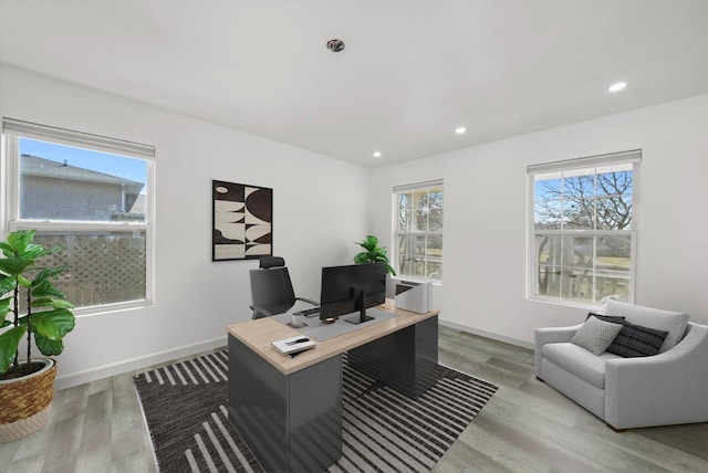 office area featuring light hardwood / wood-style flooring