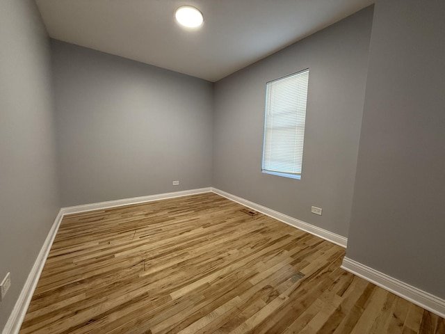 empty room featuring light hardwood / wood-style floors