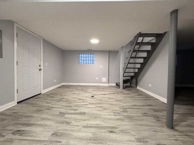 basement with light wood-type flooring