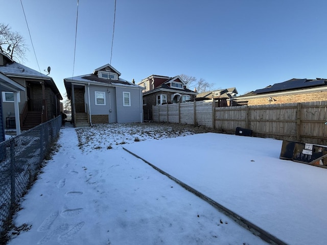 view of yard covered in snow