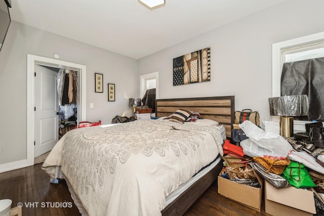 bedroom featuring dark hardwood / wood-style flooring