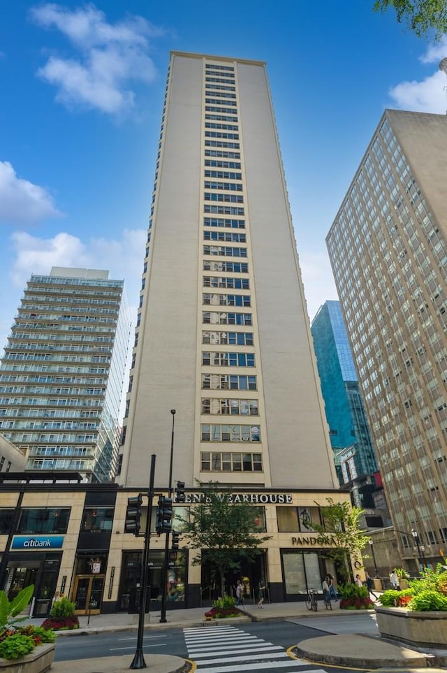 view of building exterior featuring a view of city