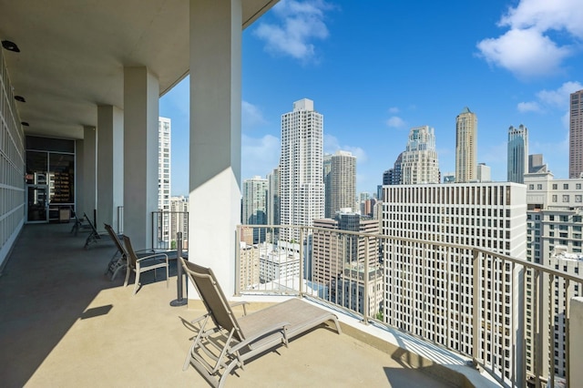 balcony featuring a city view