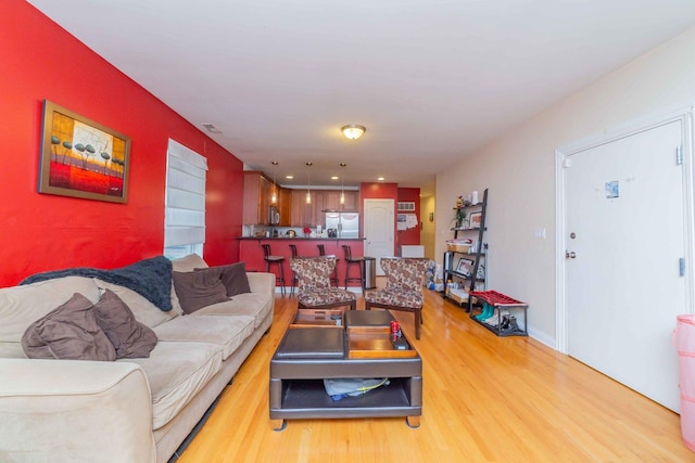 living room featuring light hardwood / wood-style floors