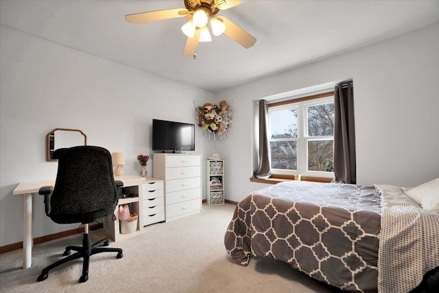 bedroom with ceiling fan and carpet floors