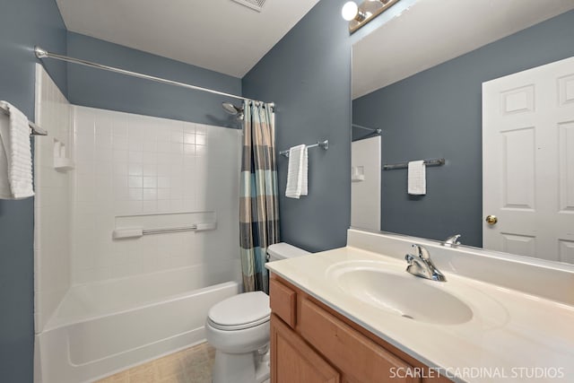 full bathroom featuring vanity, shower / tub combo, and toilet