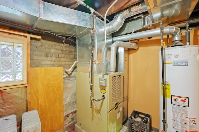 utility room with radiator, heating unit, and gas water heater