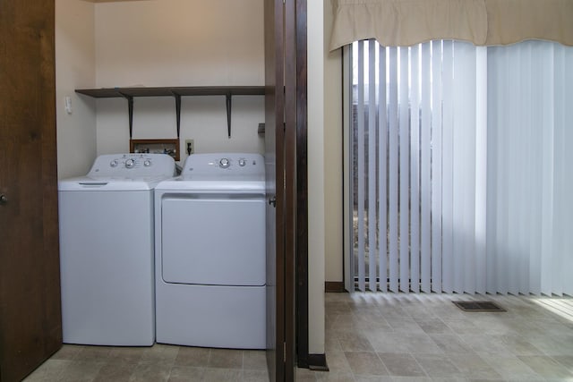 laundry room featuring washer and dryer