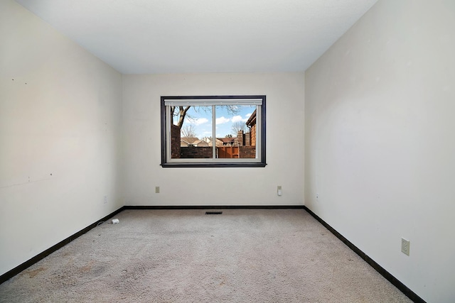 view of carpeted spare room