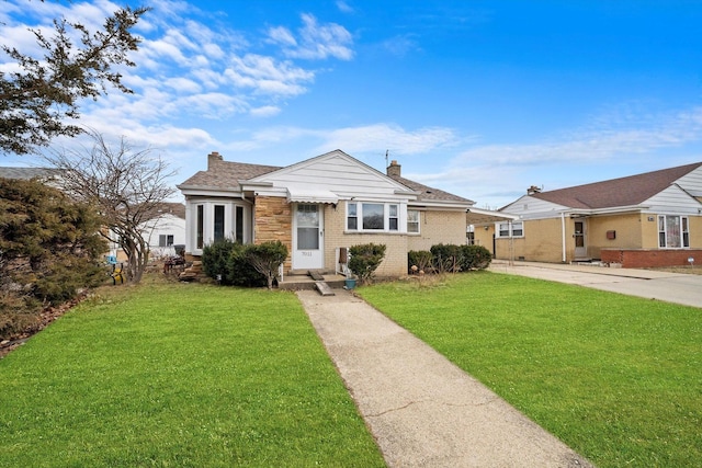 view of front of home with a front yard