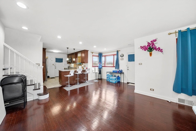 living room with hardwood / wood-style flooring