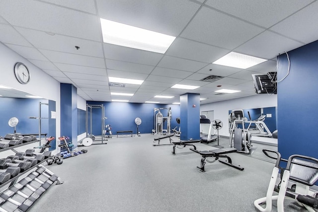 workout area with a drop ceiling