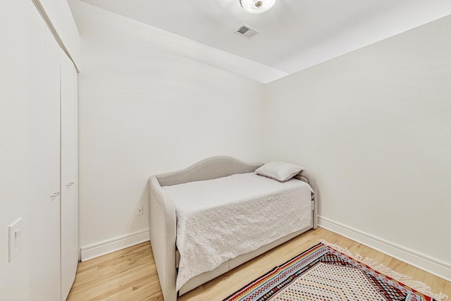 bedroom featuring light hardwood / wood-style floors