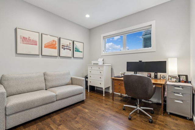 office space with dark wood-type flooring