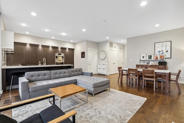 living room with dark wood-type flooring