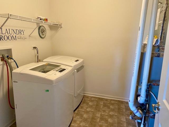 laundry area with washer and dryer