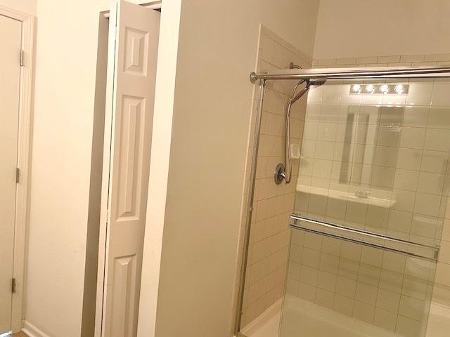 bathroom with walk in shower