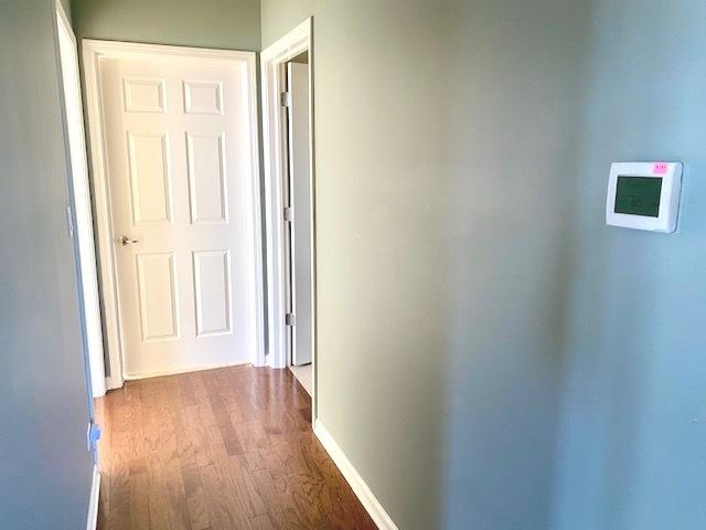 hall featuring dark hardwood / wood-style floors