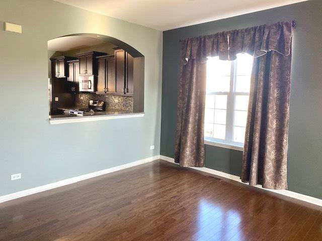 interior space featuring dark wood-type flooring