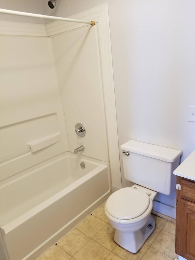 full bathroom with tile patterned floors, toilet, bathing tub / shower combination, and vanity