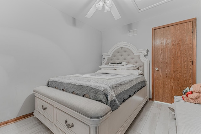 bedroom featuring light hardwood / wood-style flooring and ceiling fan