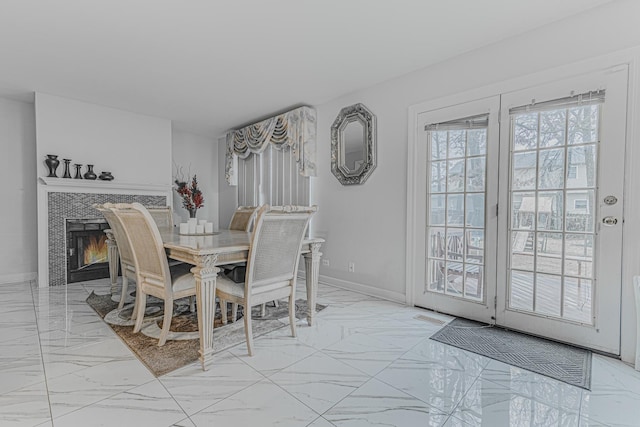 dining area with a fireplace