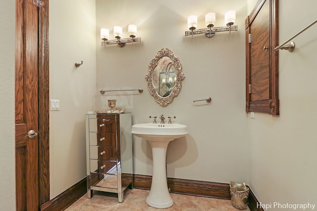 bathroom with tile patterned floors