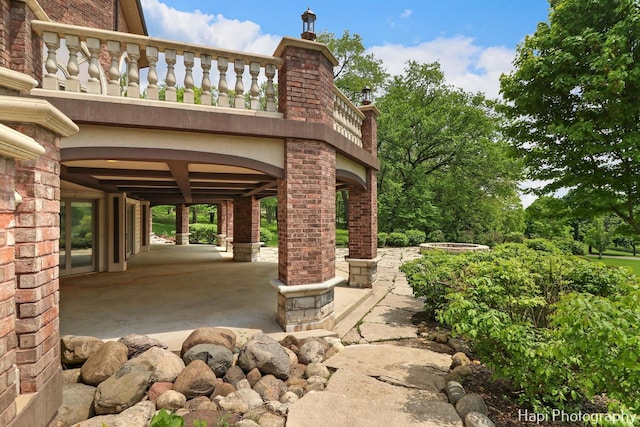 view of patio / terrace featuring a balcony