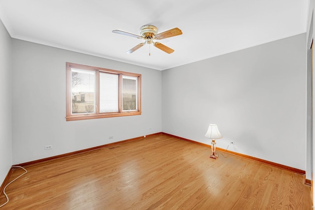 empty room with ceiling fan and light wood-type flooring