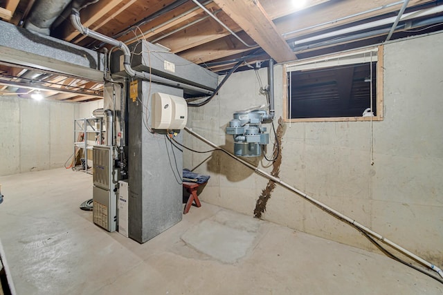 basement featuring heating unit