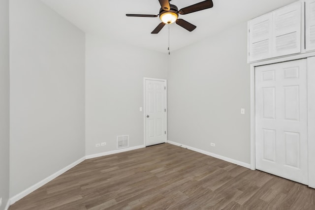 interior space featuring hardwood / wood-style flooring and ceiling fan