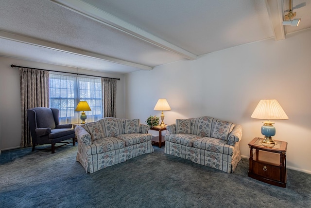 carpeted living room featuring beam ceiling