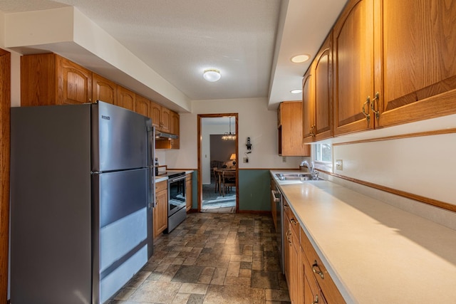 kitchen featuring stainless steel appliances and sink