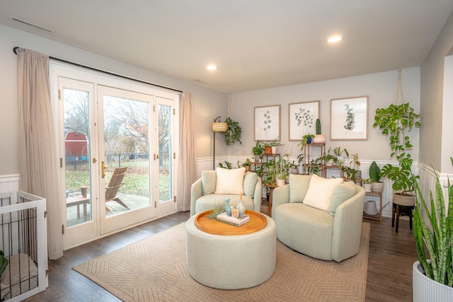 living room featuring dark wood-type flooring