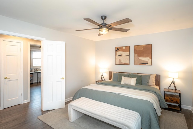 bedroom with dark wood-type flooring and ceiling fan