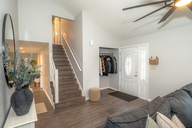 foyer featuring ceiling fan, lofted ceiling, and dark hardwood / wood-style floors