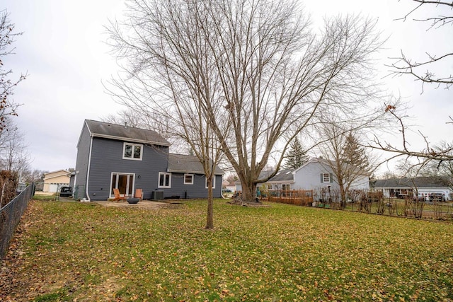 view of yard featuring cooling unit and a patio