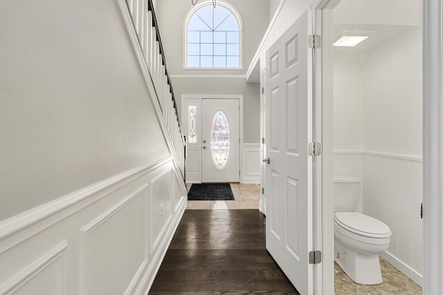 foyer entrance featuring dark hardwood / wood-style floors