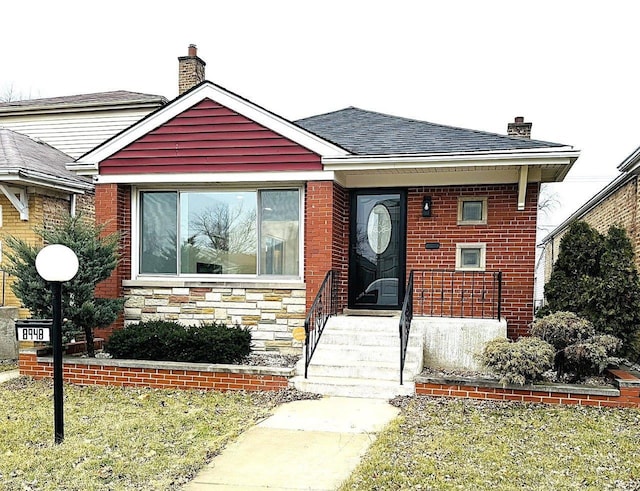 bungalow with a front lawn