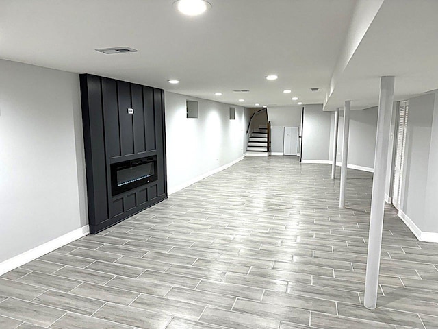 basement featuring a fireplace