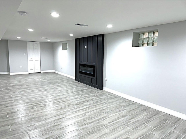 basement featuring a fireplace