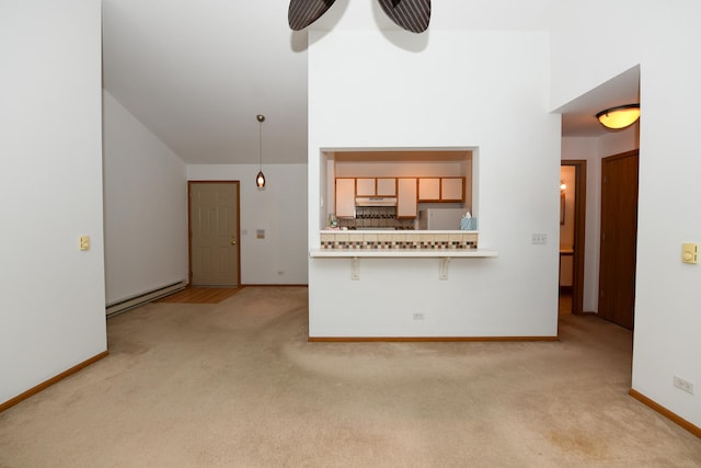 unfurnished living room featuring light carpet, a baseboard heating unit, and ceiling fan