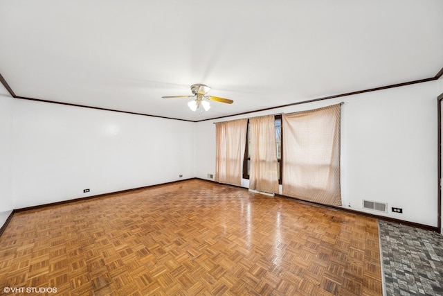 unfurnished room featuring ornamental molding, parquet flooring, and ceiling fan