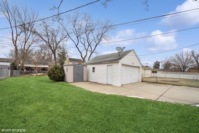 garage featuring a yard